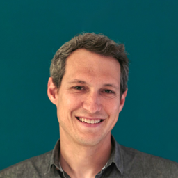 Headshot of Tommy Desilets from LANDR.