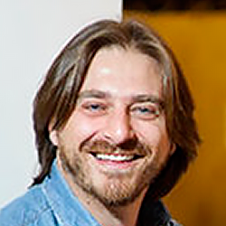 Headshot of Massimo Ciociola from MusixMatch.