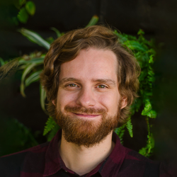Headshot of Norman Rusch from AiSight GmbH.