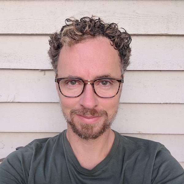Headshot of Zeke Sikelianos from GitHub.