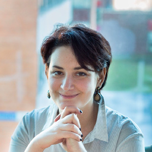 Headshot of Anna Iokhimovich from Paxful.